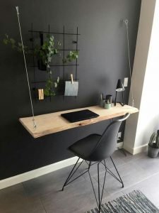 Home office organized in a unique way - wall mounted desk.